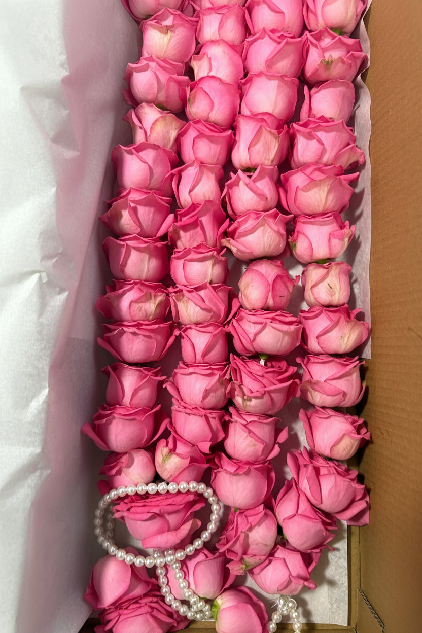 Pink rose with string of pearls garland